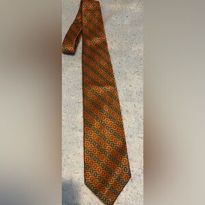 Elegant Geometric Tie in Orange and Brown